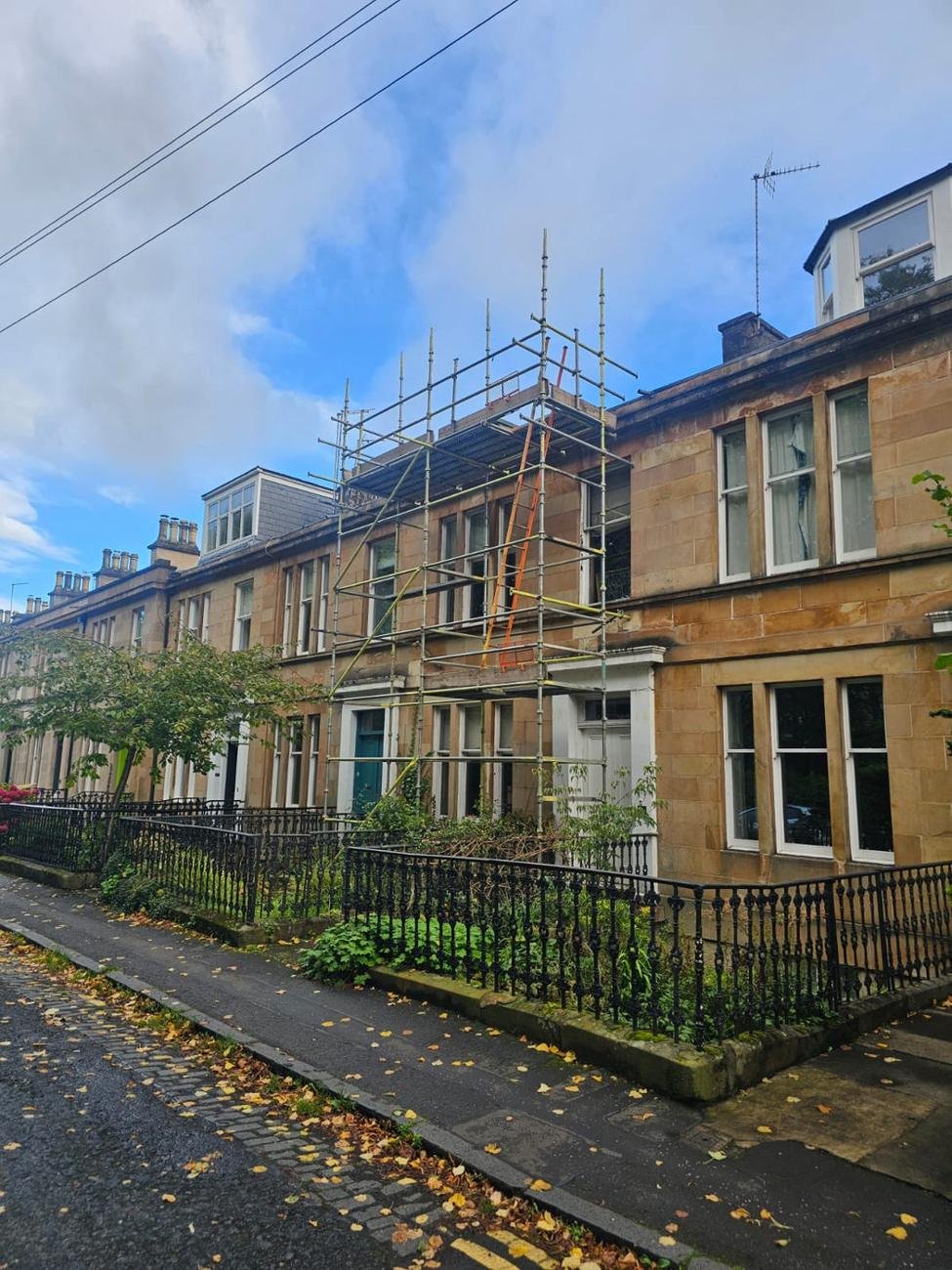Scaffold on a sandstone terraced townhouse